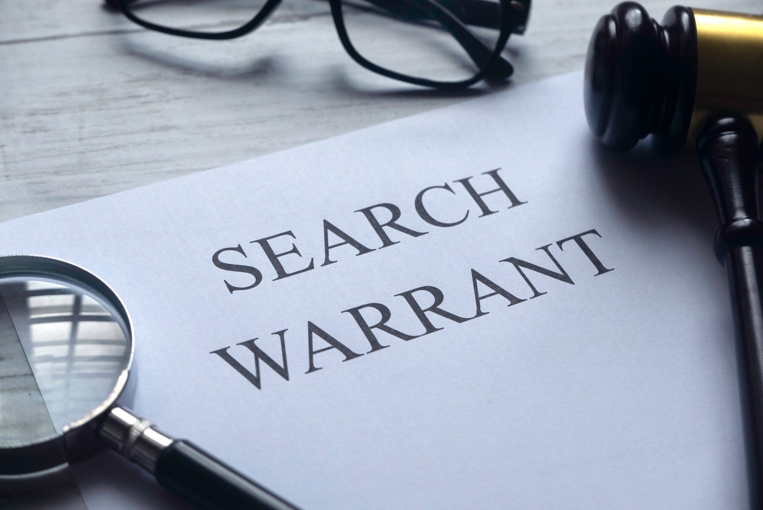 Call A criminal lawyer when faced with a search warrant. 